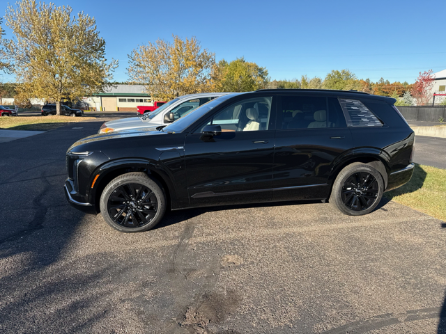 Clean black Cadillac SUV after Pit Stop Detailers service
